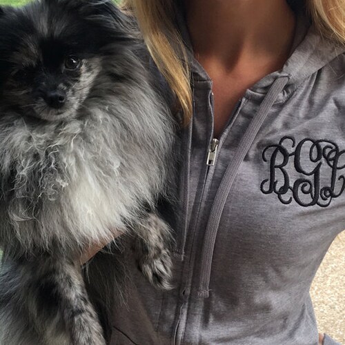 monogram zip up