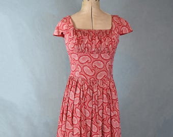 Vintage 1950s paisley print red cotton ruched front red cotton full skirt dress - 1950s fit flare full circle shelf bust swing day dress
