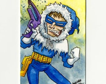 May include: A watercolor illustration of a character wearing a blue hooded parka with a white fur-lined hood, blue goggles, and a yellow utility belt. The character holds a purple ray gun in one hand against a yellow and blue background.