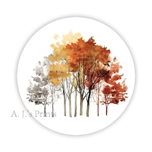 May include: Round art print featuring a watercolor painting of a cluster of trees. The trees display a gradient of colors, including shades of gray, gold, orange, and red. The text "A. J.'s Prints" is printed in gray at the bottom left.
