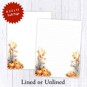 May include: Two white 8.5 x 11 inch full-page sheets of paper, one lined and one unlined, with a watercolor design of pumpkins and fall foliage in the corners. The text "Lined or Unlined" is at the bottom.