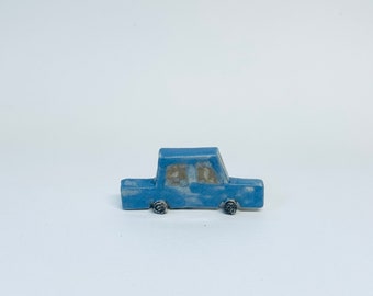 Pale blue mini car sculpture
