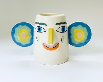 Rainbow ears happy face vase