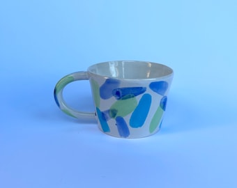 Colourful spotty stoneware mug