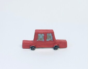 Red mini car sculpture