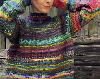 Handmade knitted bright and colorful soft Merino wool striped sweater made from tie-dyed wool