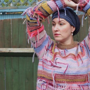 Handmade knitted bright and colourful pink striped polyester yarn jumper