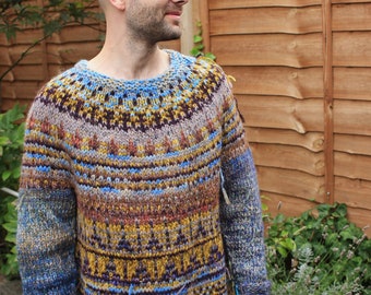 Handmade knitted Icelandic Fair Isle wool sweater with bright blue pattern and brown mustard body