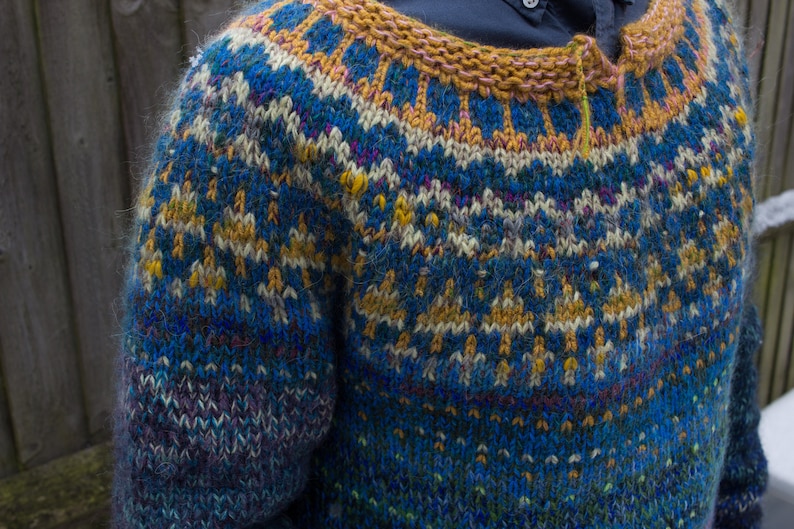 Handmade knitted deep blue Icelandic style natural Merino wool men sweater with bright pattern