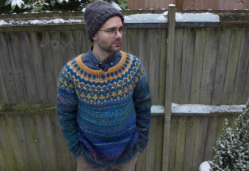 Handmade knitted deep blue Icelandic style natural Merino wool men sweater with bright pattern