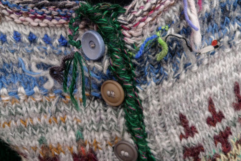 Handmade grey striped wool cardigan with green sleeves and buttons