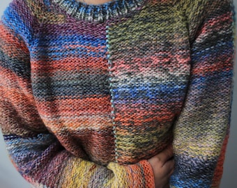 Handmade knitted natural soft wool coral orange, gray and blue oversized unisex sweater