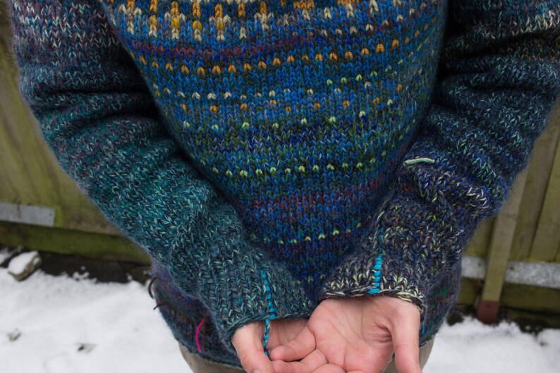Handmade knitted deep blue Icelandic style natural Merino wool men sweater with bright pattern