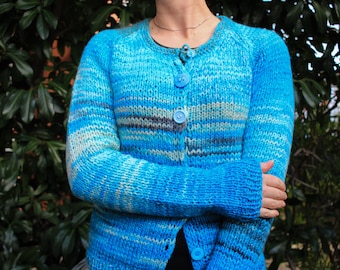 Hand-knitted light blue natural wool women's cardigan