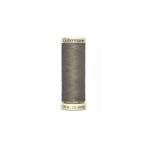 May include: A spool of Gutermann thread in a dark grey colour. The spool is labelled "Gutermann" and "100 m - 110 yds/vgs".