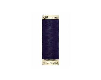 May include: A spool of dark blue Gutermann thread with a gold label that reads "Gutermann". The spool is 100 meters long, or 110 yards.