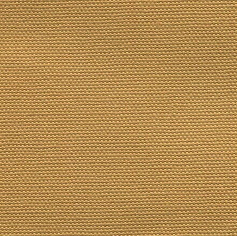 Pu&ograve; includere: Un primo piano di un tessuto marrone tessuto con una texture sottile.