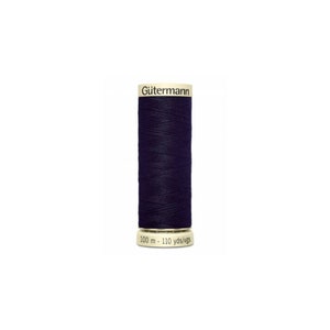 May include: A spool of dark navy blue Gütermann thread. The label indicates 100 m - 110 yds/vgs. The thread is tightly wound on a white spool, suitable for sewing and craft projects.