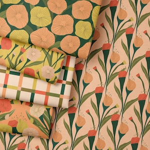May include: Four different patterned fabric swatches with floral designs. The top swatch features a green background with large yellow and orange flowers. The second swatch has a yellow background with smaller orange and yellow flowers. The third swatch is a plaid pattern with green, orange, and white squares. The bottom swatch has a peach background with orange and yellow flowers.