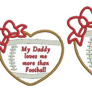 May include: Three heart-shaped designs with a football pattern and a red bow. The text on each heart reads "My Daddy loves me more than Football!"
