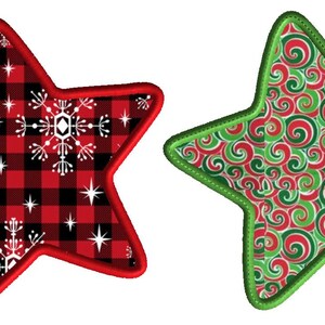 May include: Two red and green star-shaped ornaments with different patterns. One star has a red and black plaid pattern with white snowflakes. The other star has a green and red swirl pattern.