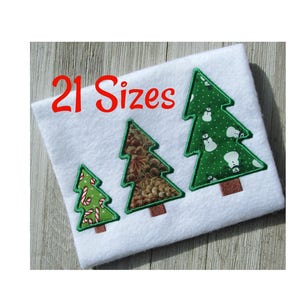 May include: Three different Christmas tree designs for embroidery. The trees are green with different patterns, including candy canes, snowmen, and pine cones. The text "21 Sizes" is at the top of the image.