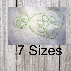 May include: Two green paw print designs in the shape of hearts. The larger heart has a paw print inside. The smaller heart has a paw print inside. The text "7 Sizes" is below the hearts.