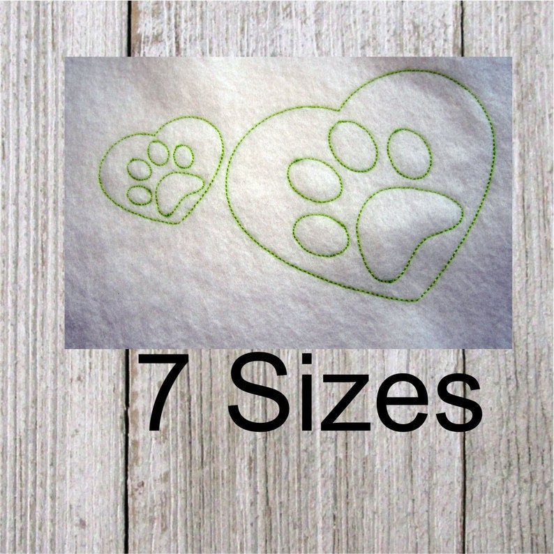 May include: Two green paw print designs in the shape of hearts. The larger heart has a paw print inside. The smaller heart has a paw print inside. The text "7 Sizes" is below the hearts.
