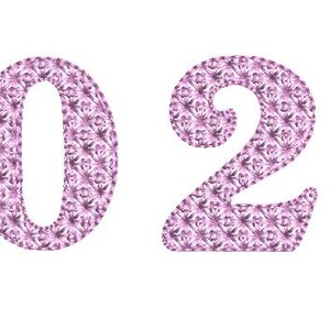 May include: The number 2026 in a light purple floral pattern against a white background. The numbers are stylized with a decorative design, creating a visually appealing and festive appearance. The image is suitable for various design projects.