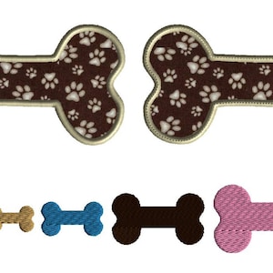 Puede incluir: Dos parches en forma de hueso de color marrón con huellas de patas blancas, y seis parches en forma de hueso más pequeños en rojo, beige, azul, negro y rosa.