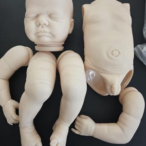 First Edition 19 inch (Sold Out) Reborn Kit Harper. Includes cloth body.