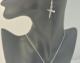 6 Piece Religious Cross Necklace and Earrings Set, designed by Joan Mitchell.