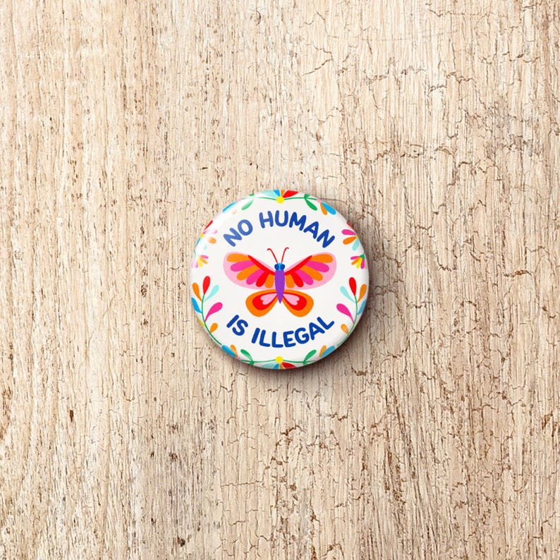 No Human Is Illegal Pin Button - Pro-Immigration Migration Butterfly Pinback Buttons image 1