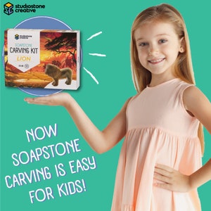 Girl holding soapstone lion carving craft kit. Text reads "now soapstone carving is easy for kids!"