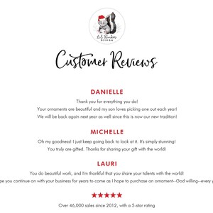 a cat sitting on top of a table next to a white wall