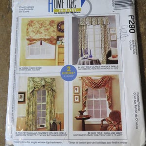 May include: A McCall's Home Dec sewing pattern envelope featuring four window treatment designs. The designs include a tassel roman shade, a jiffy fold valance, a trumpet swag with cascades, and an easy pole swag and jabot. The envelope is white with colorful illustrations.