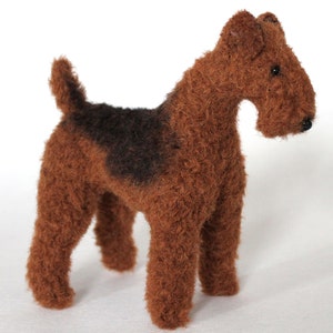 Toy top airedale terrier