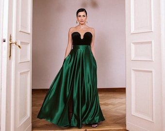 Elegant satin evening skirt with a high slit, bottle green