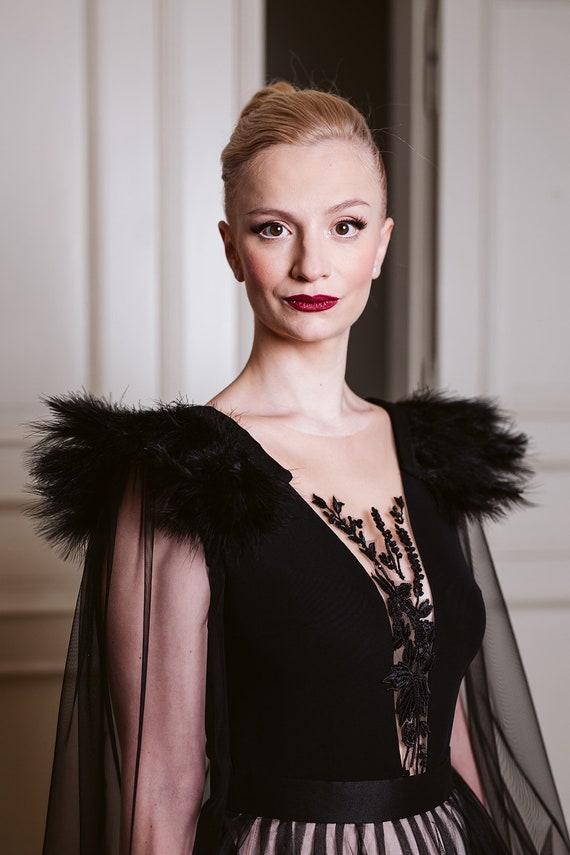Black bodysuit with puffy tulle sleeves, evening top with feathers and embroidery