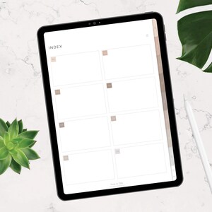 Puede incluir: Una plantilla de planificador digital con la palabra "INDEX" en la parte superior. La plantilla tiene una cuadr&iacute;cula de 12 casillas con n&uacute;meros en cada casilla. Las casillas sirven para enumerar temas o asuntos.