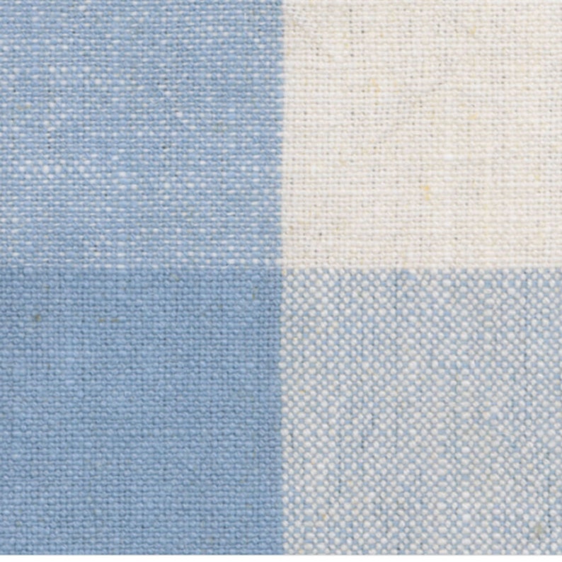 May include: A blue and white checkered fabric with a woven texture.
