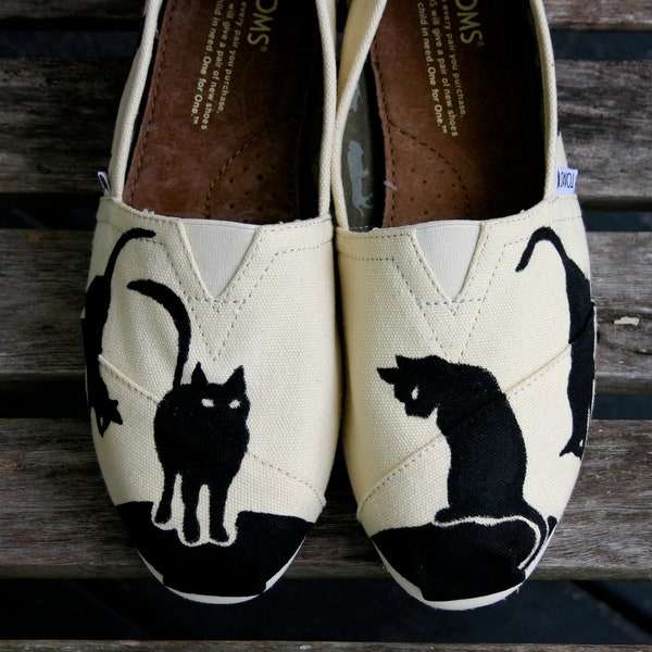 Black Cat Tom ( I supply the Tom)  Check with me if you want a Van or other shoes.