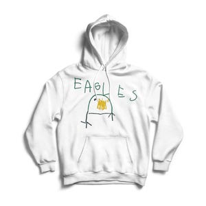 Könnte beinhalten: Weißer Kapuzenpullover mit einer Kängurutasche vorne. Das Wort "EAGLES" steht in Grün über einer Cartoon-Vogelzeichnung. Der Vogel ist gelb, grün und schwarz.