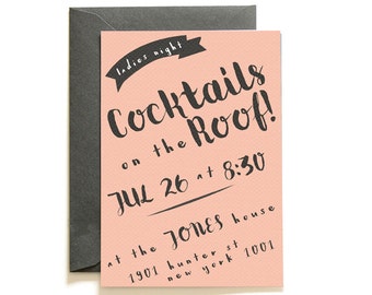 May include: A pink invitation card with black lettering and a dark grey envelope. The card reads "Ladies Night Cocktails on the Roof!" with the date July 26 at 8:30 PM and the address.