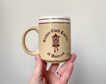 Cuckoo Clock Capitol of America, The Worlds Largest Cuckoo Clock Mug, Wilmot Ohio Mug, Alpine-Alpa, vintage souvenir landmark mug