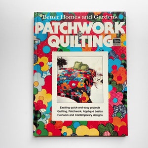 May include: A vintage "Better Homes and Gardens" book titled "Patchwork & Quilting." The cover features a colorful floral pattern and an image of a quilt. Text on the cover promotes quick and easy projects, including quilting, patchwork, and appliqué.