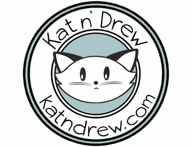 May include: Black and white illustration of a cat with a cute expression inside a circle with the text "Kat'n Drew katndrew.com" in black.