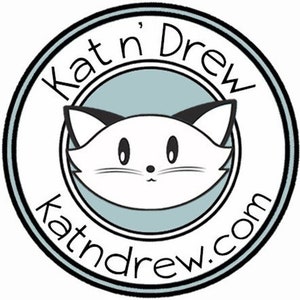 May include: Black and white logo with a stylized cat in a circle. The text "Kat 'n Drew katndrew.com" is around the circle.