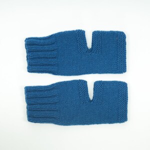 May include: A pair of blue fingerless knitted gloves. The gloves are made of a soft, warm material and have a fingerless design.