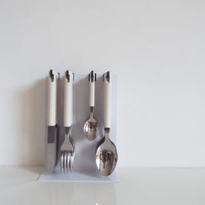 Vintage cutlery, 16 pc flatware, Abert Italy, knives spoons forks and small spoons, stainless steel and white handles, 1980 Italian design